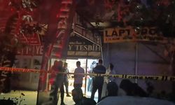 Yemek masasında karısını başından vurdu