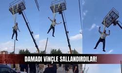 Damadı vinçle sallandırdılar, altında göbek attılar