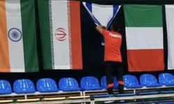 Sivaslı milli sporcu İsrail bayrağını düğümledi
